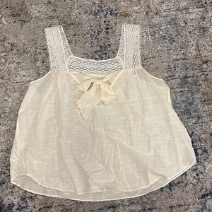 cream madewell blouse with bow in back.